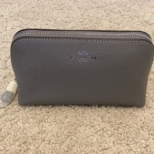 Coach gray makeup bag. New without tags.